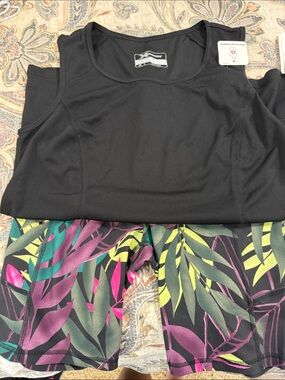 Xersion Tropical bike shorts and black tank top med and xlg